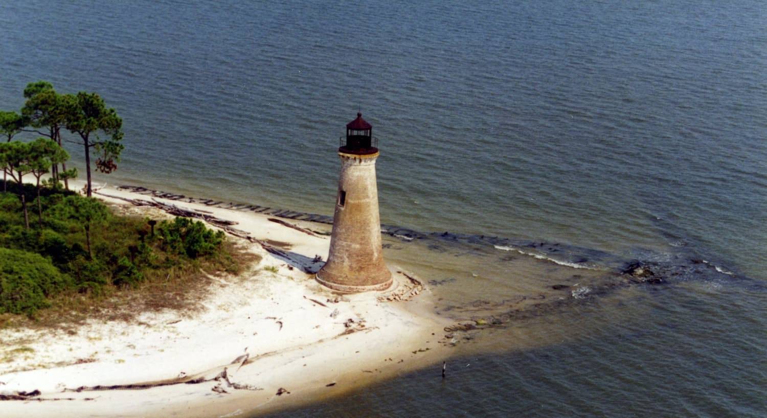 Round Island Lighthouse in its original location on the point of Round Island