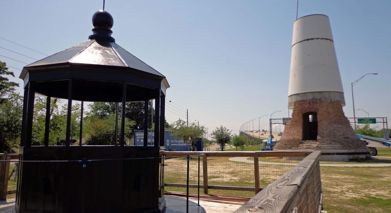 Original lantern gallery in foreground and original base of lighthouse in background during reconstruction
